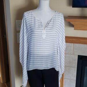 White House Black Market stripe poncho.